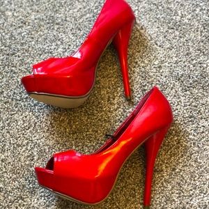 Red platform peep toe pumps